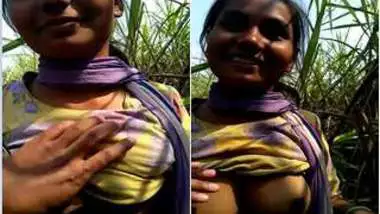 Enticing Indian chick allows boy to touch her XXX breasts outdoors