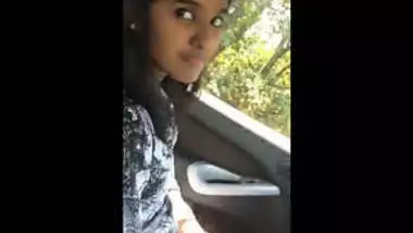 Cute girl sucking in car